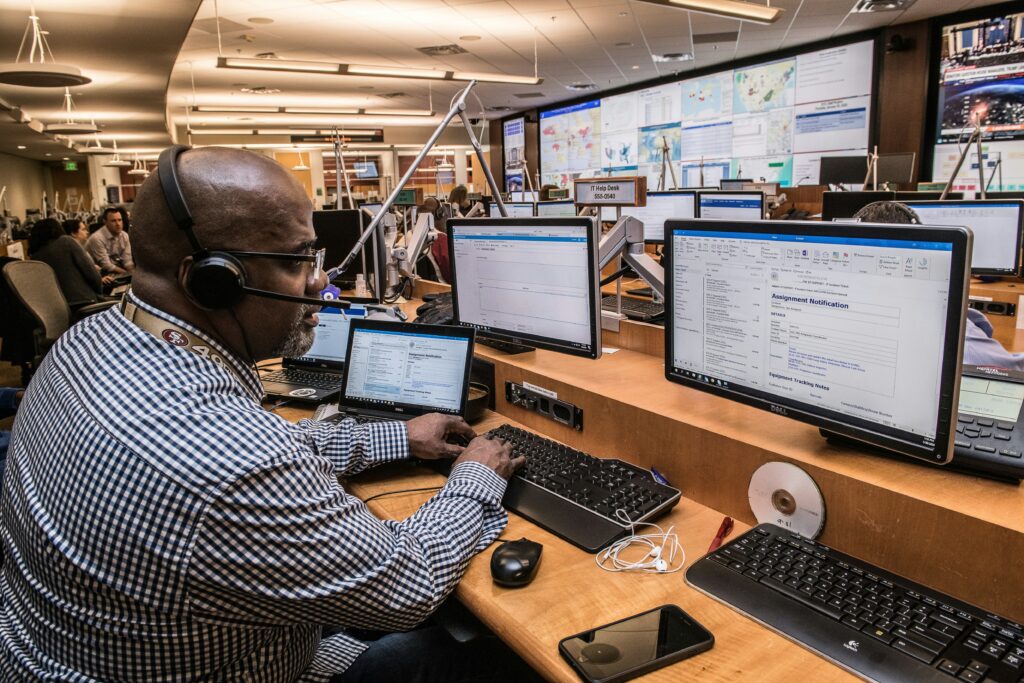IT support team monitoring systems and handling escalations in a co-managed IT services setup