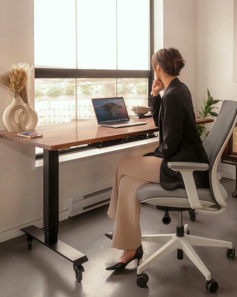Endpoint Management image of a remote worker using a laptop at a desk