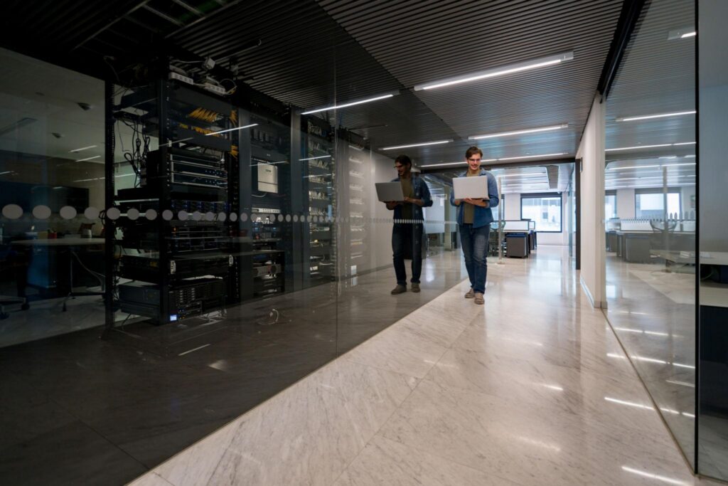 IT support technicians working near server racks for managed IT services in Downtown Los Angeles businesses