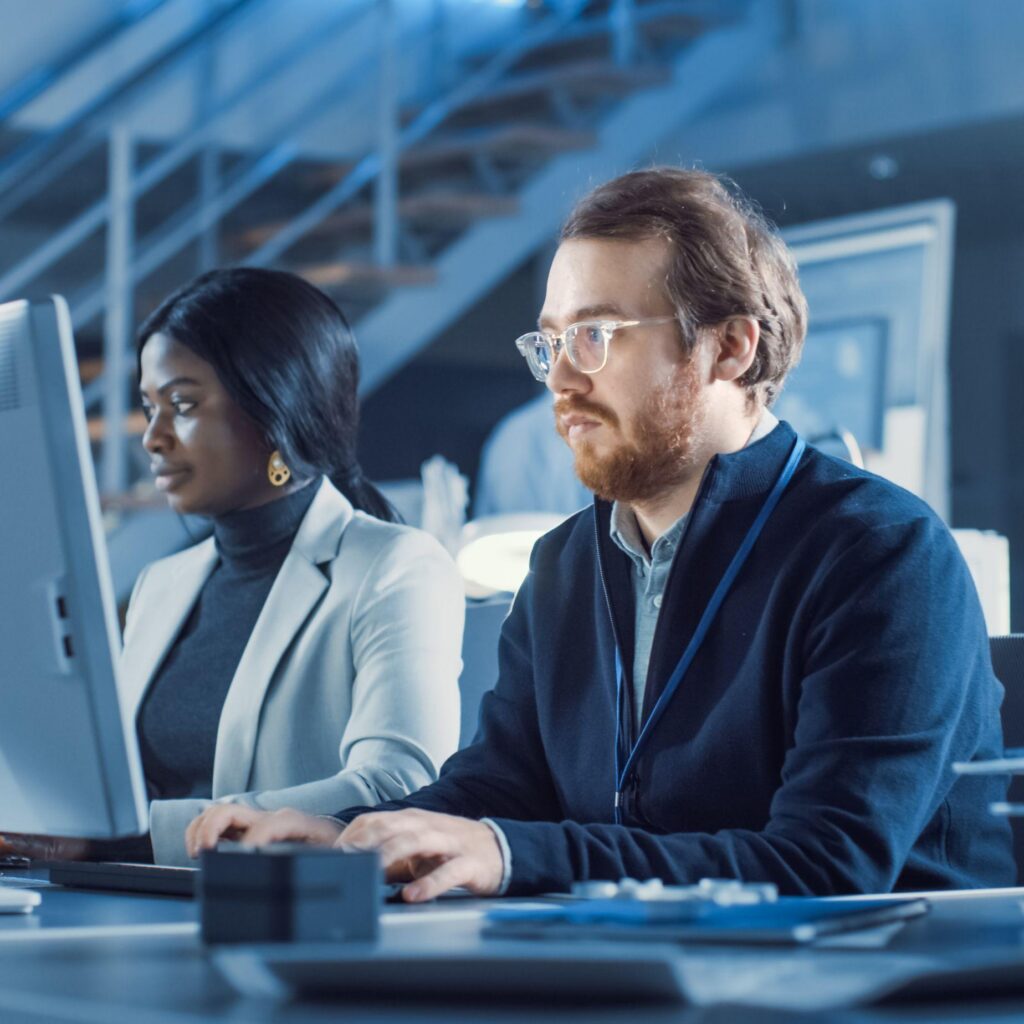 IT support professionals monitoring business systems for managed IT services in Pacific Palisades CA