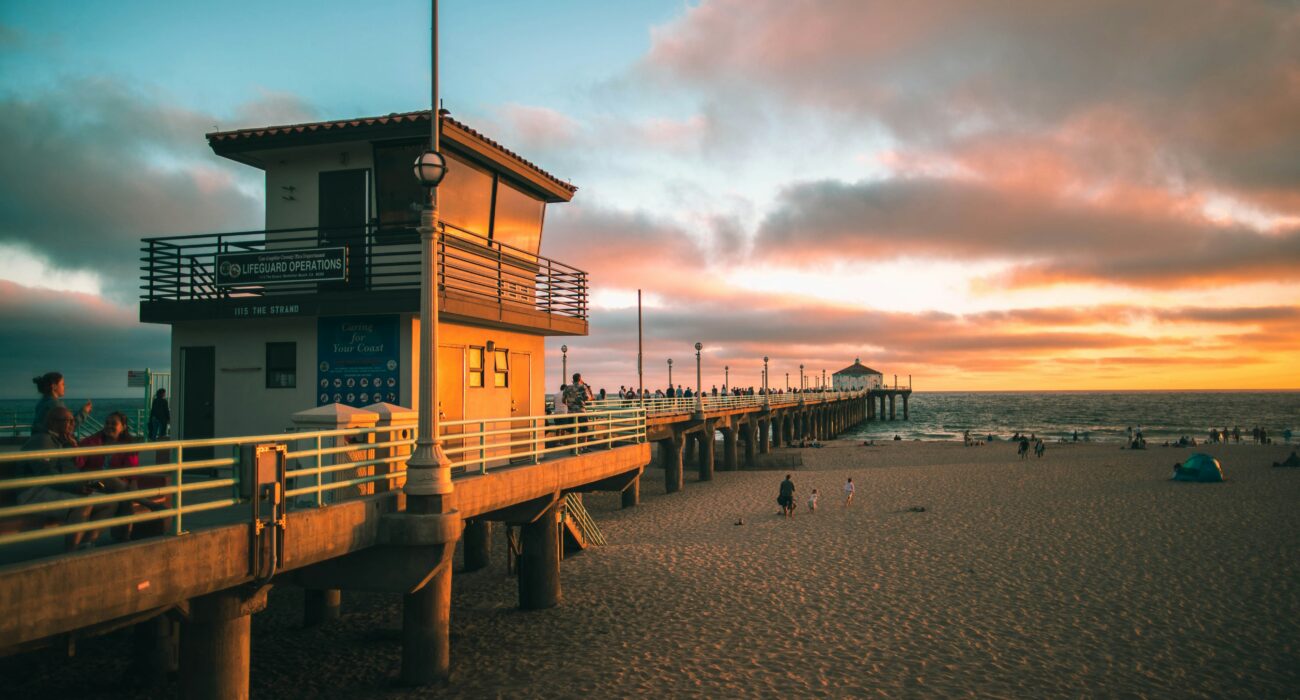 Manhattan Beach pier at sunset near local businesses comparing top IT support companies in Manhattan Beach CA