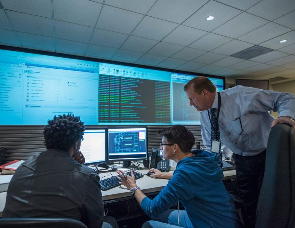 IT professionals monitoring cybersecurity systems for businesses in El Segundo, CA.