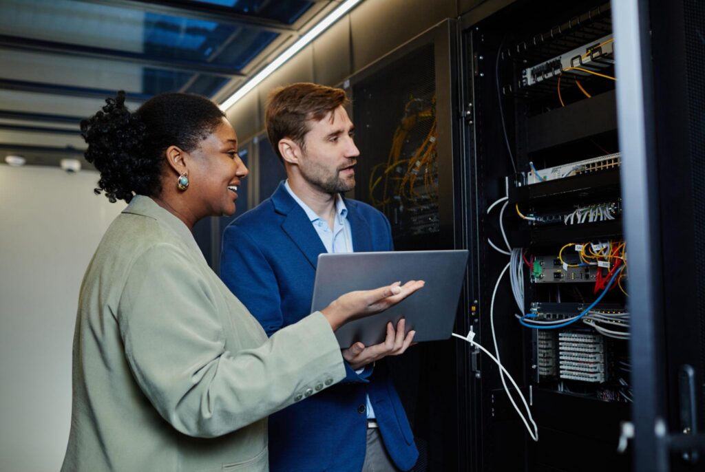 Cybersecurity specialists reviewing server infrastructure for cybersecurity services in Glendale business environments