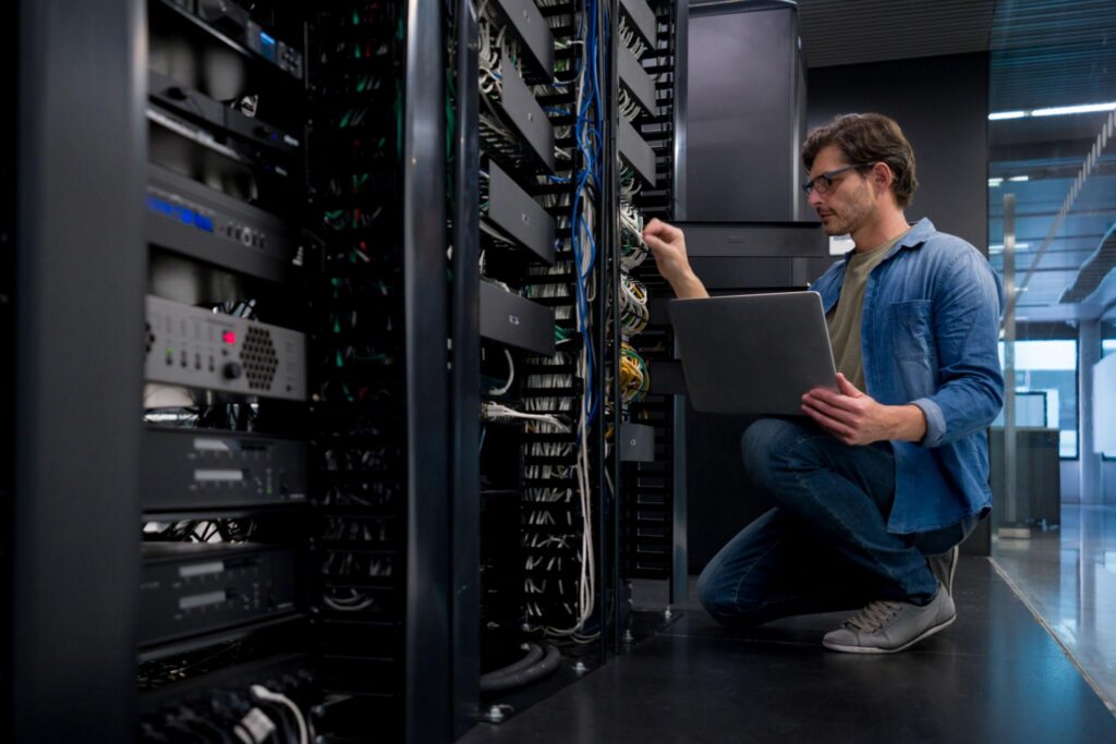IT technician managing network equipment for reliable IT support in Santa Monica business environments