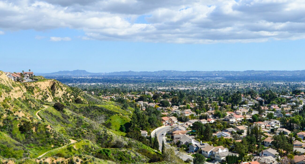 Wide city view of homes and businesses across the San Fernando Valley in Los Angeles