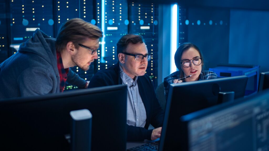 Cybersecurity team monitoring systems and threats for businesses using cybersecurity services in Glendale