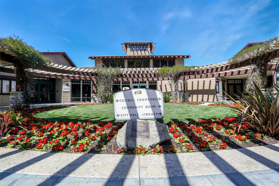 Agoura Hills Civic Center and Library building with landscaped gardens under a clear blue sky